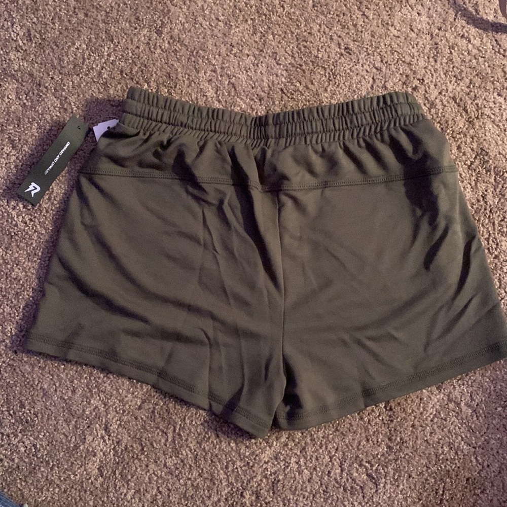 Olive green sport shorts with elastic waist